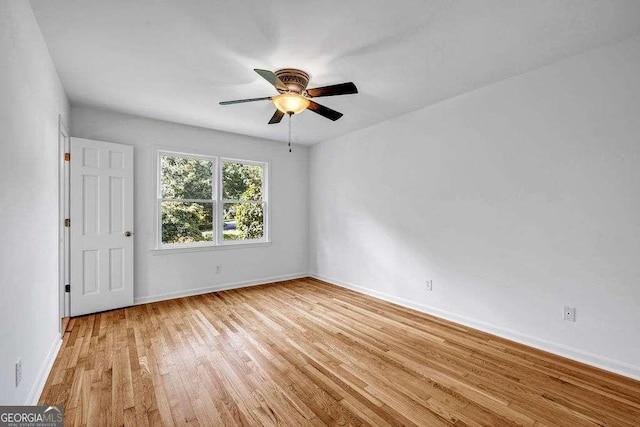 2585 Regency Dr E, Tucker, GA 30084 - unfurnished room with light wood finished floors and ceiling fan