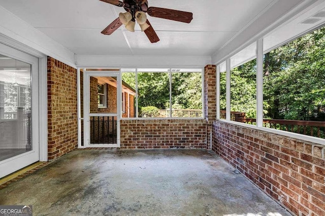 2585 Regency Dr E, Tucker, GA 30084 - unfurnished sunroom featuring ceiling fan