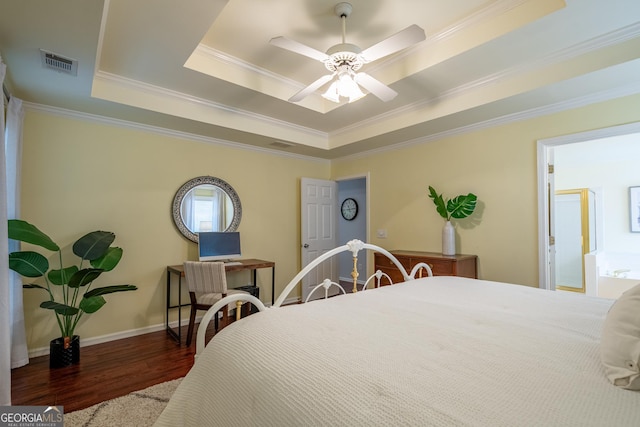 1805 Millstone Ct, Alpharetta, GA 30004 - bedroom featuring a tray ceiling, wood finished floors, crown molding, and a ceiling fan