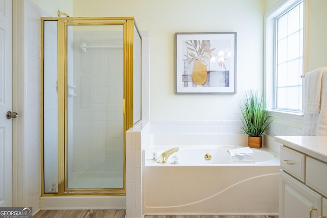 1805 Millstone Ct, Alpharetta, GA 30004 - bathroom featuring vanity, a stall shower, and a garden tub