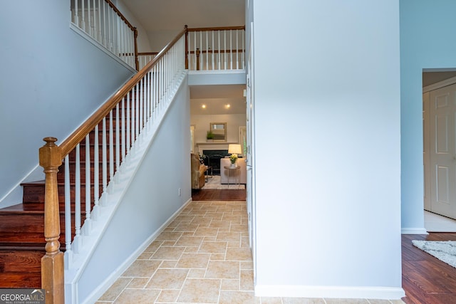 1805 Millstone Ct, Alpharetta, GA 30004 - stairs with a towering ceiling and baseboards