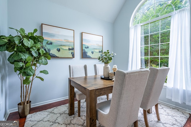 1805 Millstone Ct, Alpharetta, GA 30004 - dining room with healthy amount of natural light, vaulted ceiling, and wood finished floors