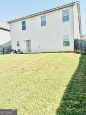 113 Truman Ct, Jackson, GA 30233 - back of house featuring a yard