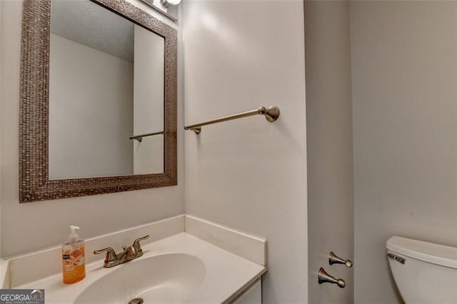 5385 Spotted Fawn Ct, Suwanee, GA 30024 - half bath featuring toilet and vanity