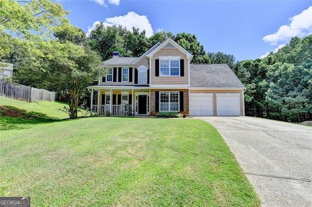 5385 Spotted Fawn Ct, Suwanee, GA 30024 - colonial-style house with an attached garage, covered porch, concrete driveway, brick siding, and a chimney