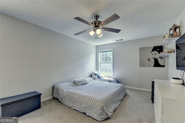 5385 Spotted Fawn Ct, Suwanee, GA 30024 - bedroom featuring light carpet, a textured ceiling, and ceiling fan