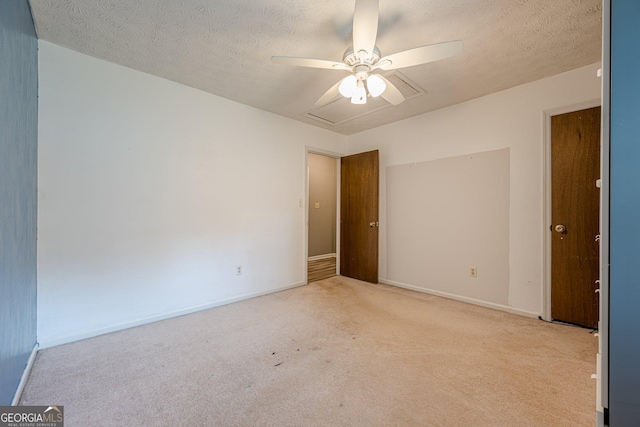 5868 Kingswood Ct NW, Norcross, GA 30093 - empty room with a ceiling fan, light colored carpet, and a textured ceiling