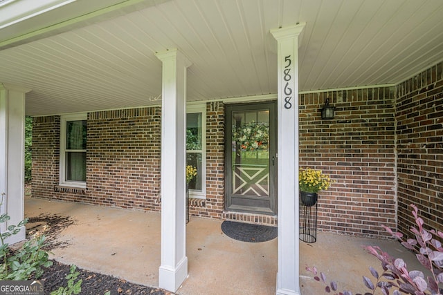5868 Kingswood Ct NW, Norcross, GA 30093 - entrance to property featuring brick siding and a porch