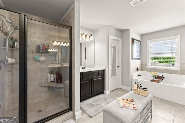 2213 Independence Ln, Buford, GA 30519 - bathroom featuring tile patterned flooring, a stall shower, vanity, and a bath