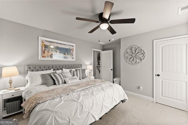 2213 Independence Ln, Buford, GA 30519 - carpeted bedroom with baseboards and a ceiling fan