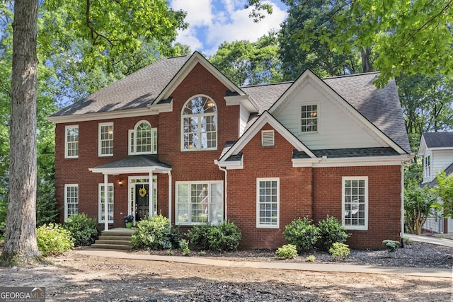 1120 Liberty Ln, Bogart, GA 30622 - view of front of home featuring brick siding, a shingled roof, and french doors