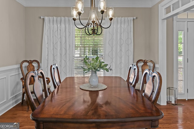 1120 Liberty Ln, Bogart, GA 30622 - dining space featuring a chandelier, ornamental molding, and wood finished floors