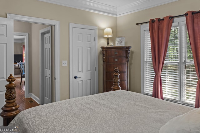 1120 Liberty Ln, Bogart, GA 30622 - bedroom with crown molding and wood finished floors