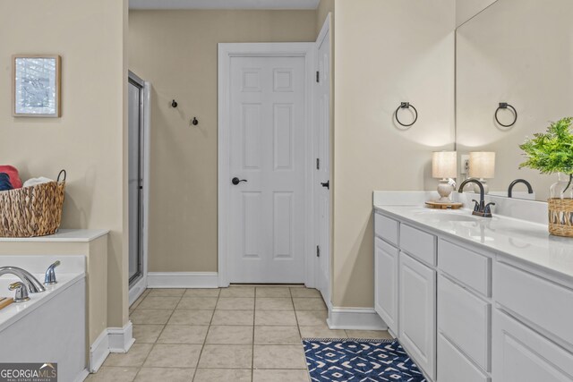 1120 Liberty Ln, Bogart, GA 30622 - full bathroom with vanity, a stall shower, tile patterned flooring, and a bath