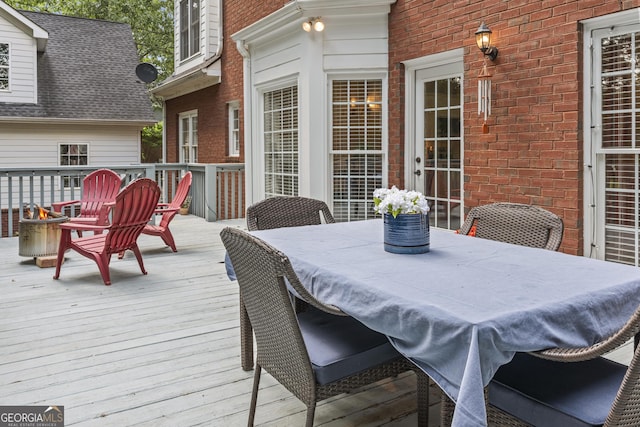 1120 Liberty Ln, Bogart, GA 30622 - wooden deck featuring outdoor dining space