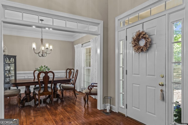 1120 Liberty Ln, Bogart, GA 30622 - entryway with a chandelier, ornamental molding, and dark wood-type flooring