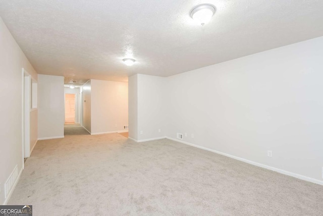 1024 Stone Mill Run, Lawrenceville, GA 30046 - spare room with light carpet and a textured ceiling
