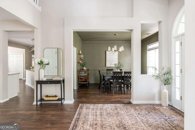 2000 Settindown Dr, Roswell, GA 30075 - foyer featuring a chandelier and wood finished floors