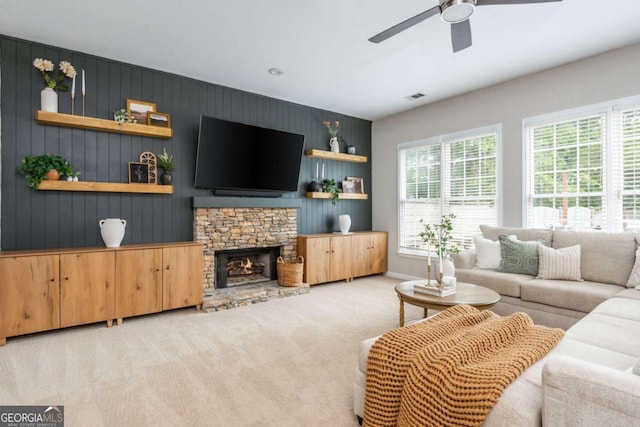 2000 Settindown Dr, Roswell, GA 30075 - living area with plenty of natural light, carpet, ceiling fan, and a stone fireplace
