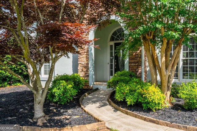 2000 Settindown Dr, Roswell, GA 30075 - view of exterior entry featuring stucco siding and stone siding