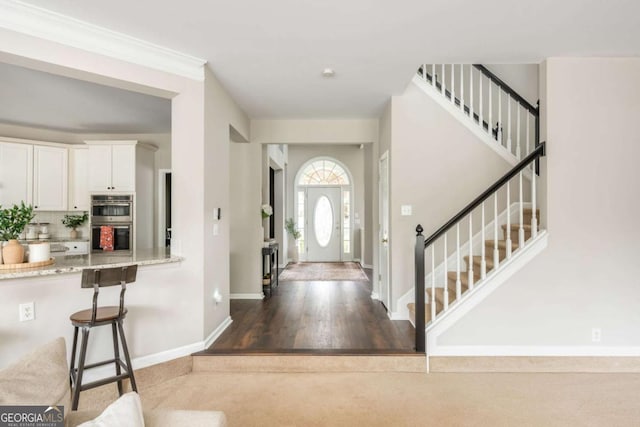 2000 Settindown Dr, Roswell, GA 30075 - entrance foyer with stairs, wood finished floors, and carpet floors