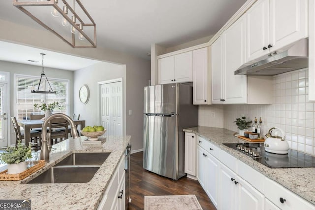 2000 Settindown Dr, Roswell, GA 30075 - kitchen with appliances with stainless steel finishes, under cabinet range hood, dark wood finished floors, and white cabinetry