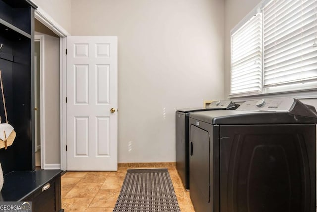 2000 Settindown Dr, Roswell, GA 30075 - laundry room featuring independent washer and dryer and baseboards