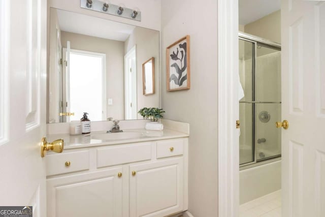 2000 Settindown Dr, Roswell, GA 30075 - bathroom with vanity and enclosed tub / shower combo