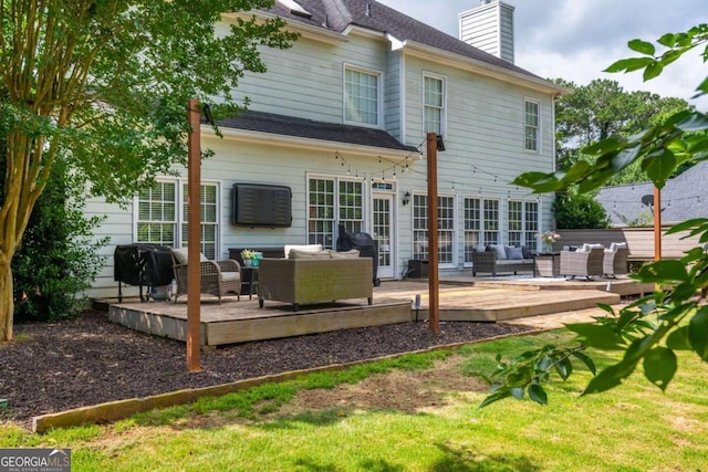 2000 Settindown Dr, Roswell, GA 30075 - rear view of house with outdoor lounge area, a wooden deck, and a chimney