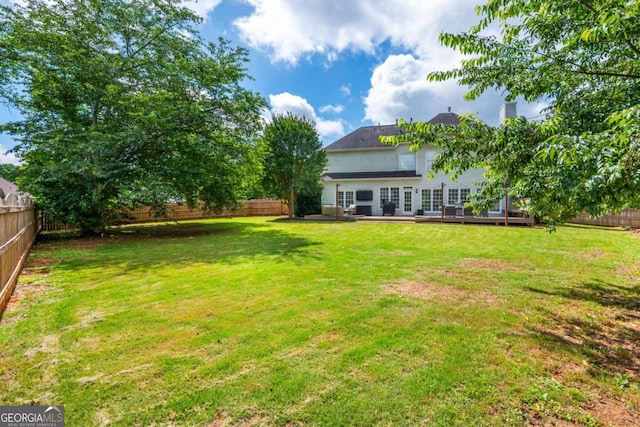 2000 Settindown Dr, Roswell, GA 30075 - fenced backyard with a deck