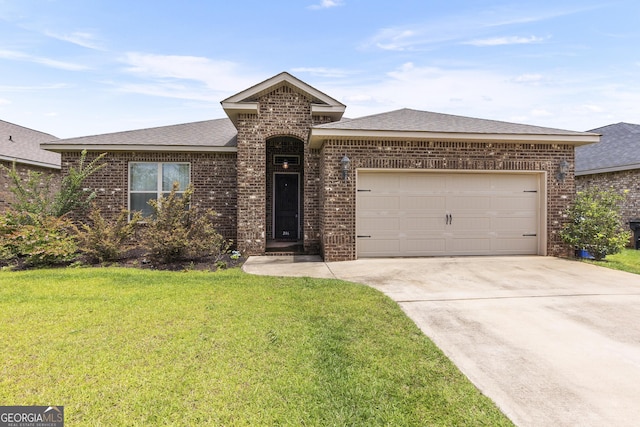 206 Barnyard Way, Perry, GA 31069 - view of front facade featuring brick siding, a front lawn, a shingled roof, concrete driveway, and a garage