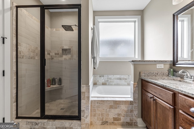 206 Barnyard Way, Perry, GA 31069 - bathroom with a stall shower, a bath, and vanity