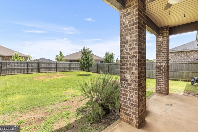 206 Barnyard Way, Perry, GA 31069 - fenced backyard featuring a patio area