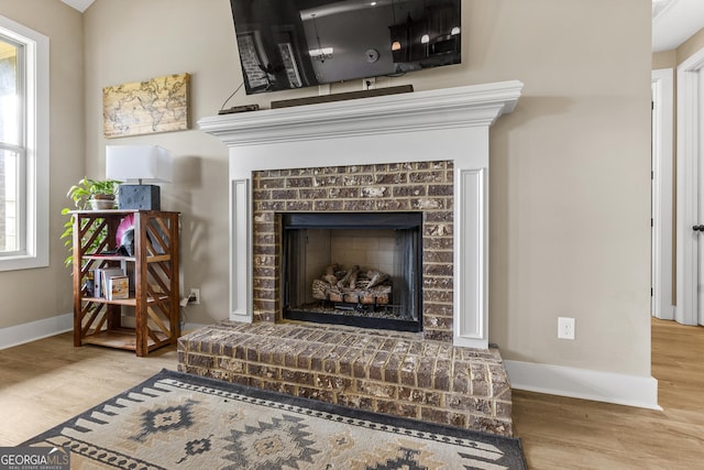 206 Barnyard Way, Perry, GA 31069 - detailed view of a fireplace and wood finished floors