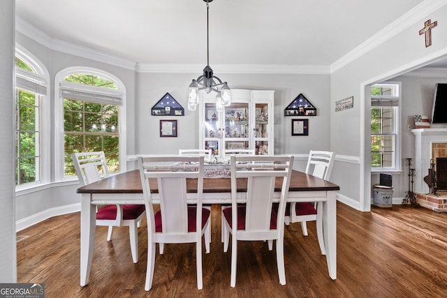 507 Wintergreen Way, Canton, GA 30115 - dining area with a chandelier, ornamental molding, wood finished floors, and healthy amount of natural light