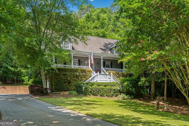 507 Wintergreen Way, Canton, GA 30115 - view of front of home with a porch, stairway, a front lawn, and a shingled roof