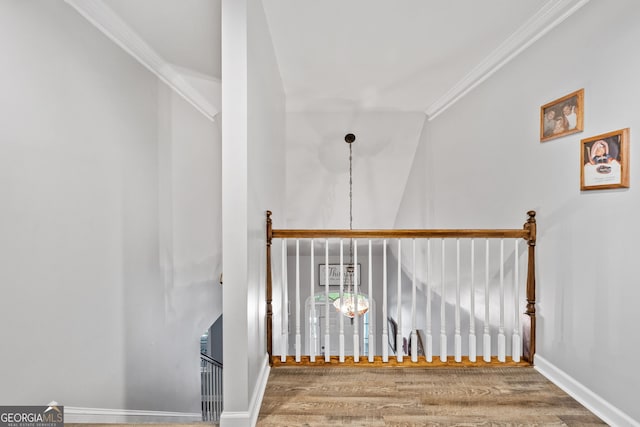 507 Wintergreen Way, Canton, GA 30115 - stairway with wood finished floors and ornamental molding