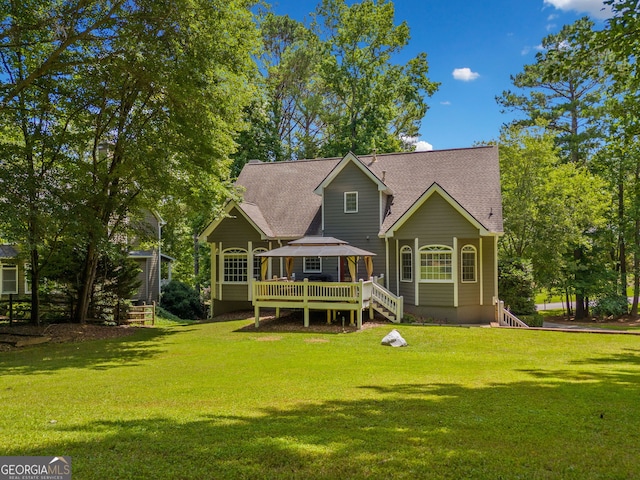 507 Wintergreen Way, Canton, GA 30115 - back of house with a wooden deck, a lawn, and a shingled roof