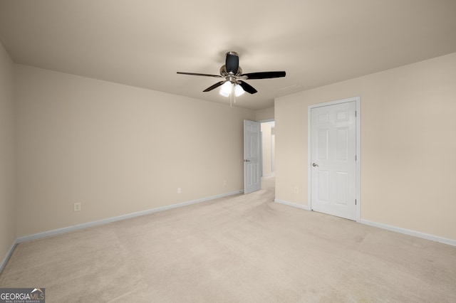 872 Misty View Ct, Lilburn, GA 30047 - unfurnished bedroom featuring light carpet and a ceiling fan