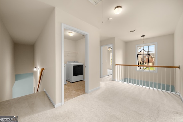 872 Misty View Ct, Lilburn, GA 30047 - hallway featuring an upstairs landing, carpet flooring, attic access, and independent washer and dryer