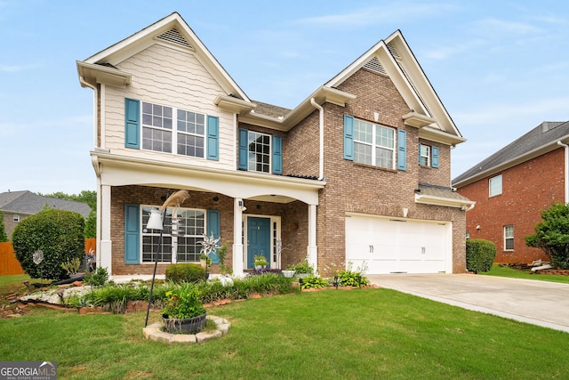 872 Misty View Ct, Lilburn, GA 30047 - view of front of home with driveway, brick siding, an attached garage, a front yard, and covered porch