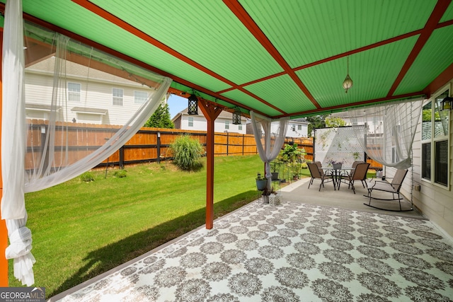 872 Misty View Ct, Lilburn, GA 30047 - fenced backyard with a patio area
