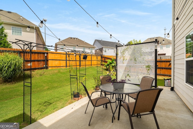 872 Misty View Ct, Lilburn, GA 30047 - fenced backyard with a patio and outdoor dining area
