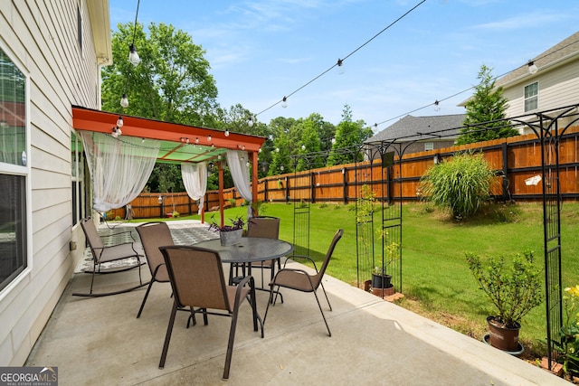 872 Misty View Ct, Lilburn, GA 30047 - fenced backyard with a patio area and outdoor dining space