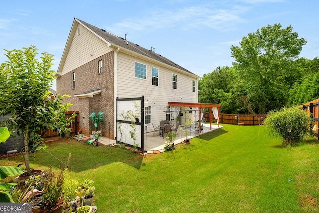 872 Misty View Ct, Lilburn, GA 30047 - back of property featuring a patio area and a fenced backyard