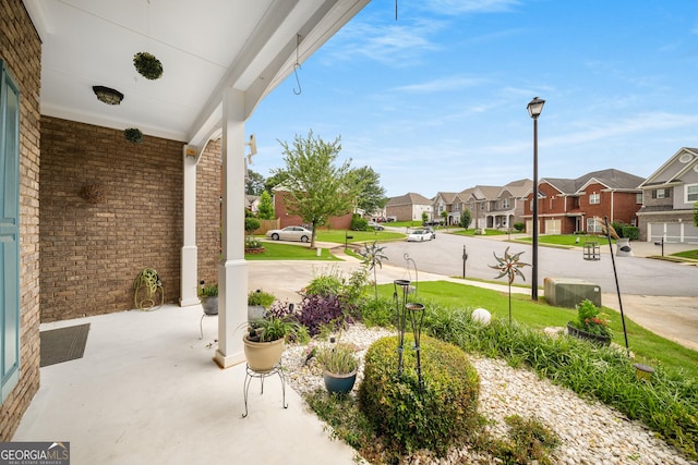 872 Misty View Ct, Lilburn, GA 30047 - covered porch featuring a residential view