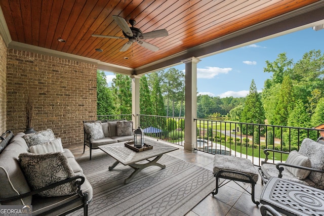 3047 Watsons Bnd, Milton, GA 30004 - wooden deck featuring an outdoor living space, ceiling fan, and view of wooded area