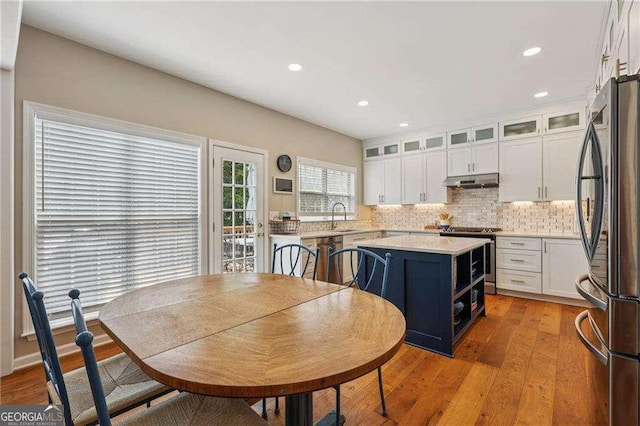 2508 Haddenham Ln SW, Smyrna, GA 30082 - dining space with light wood-style floors and recessed lighting