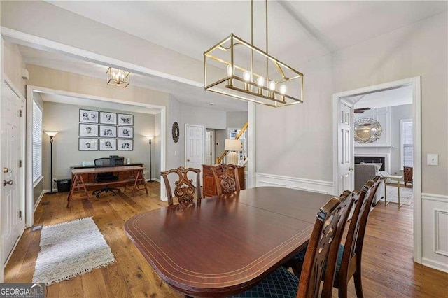 2508 Haddenham Ln SW, Smyrna, GA 30082 - dining space with wood finished floors, an office area, and a chandelier