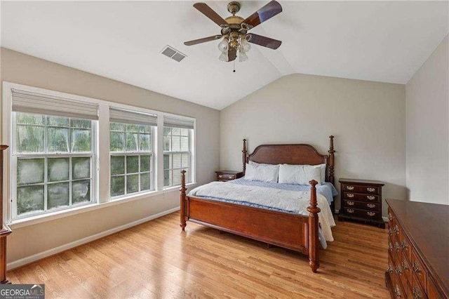 2508 Haddenham Ln SW, Smyrna, GA 30082 - bedroom featuring light wood-style floors, vaulted ceiling, and a ceiling fan